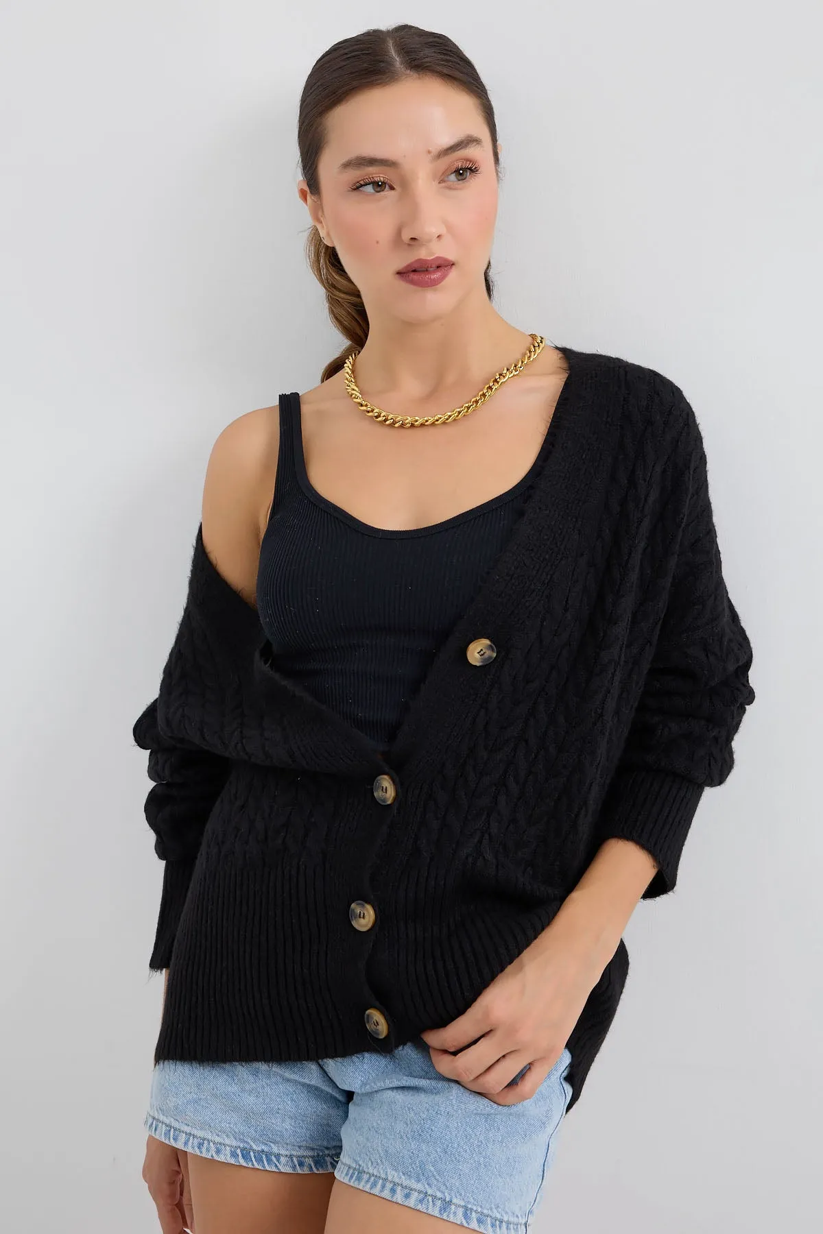 15885 örgülü oversize triko hirka